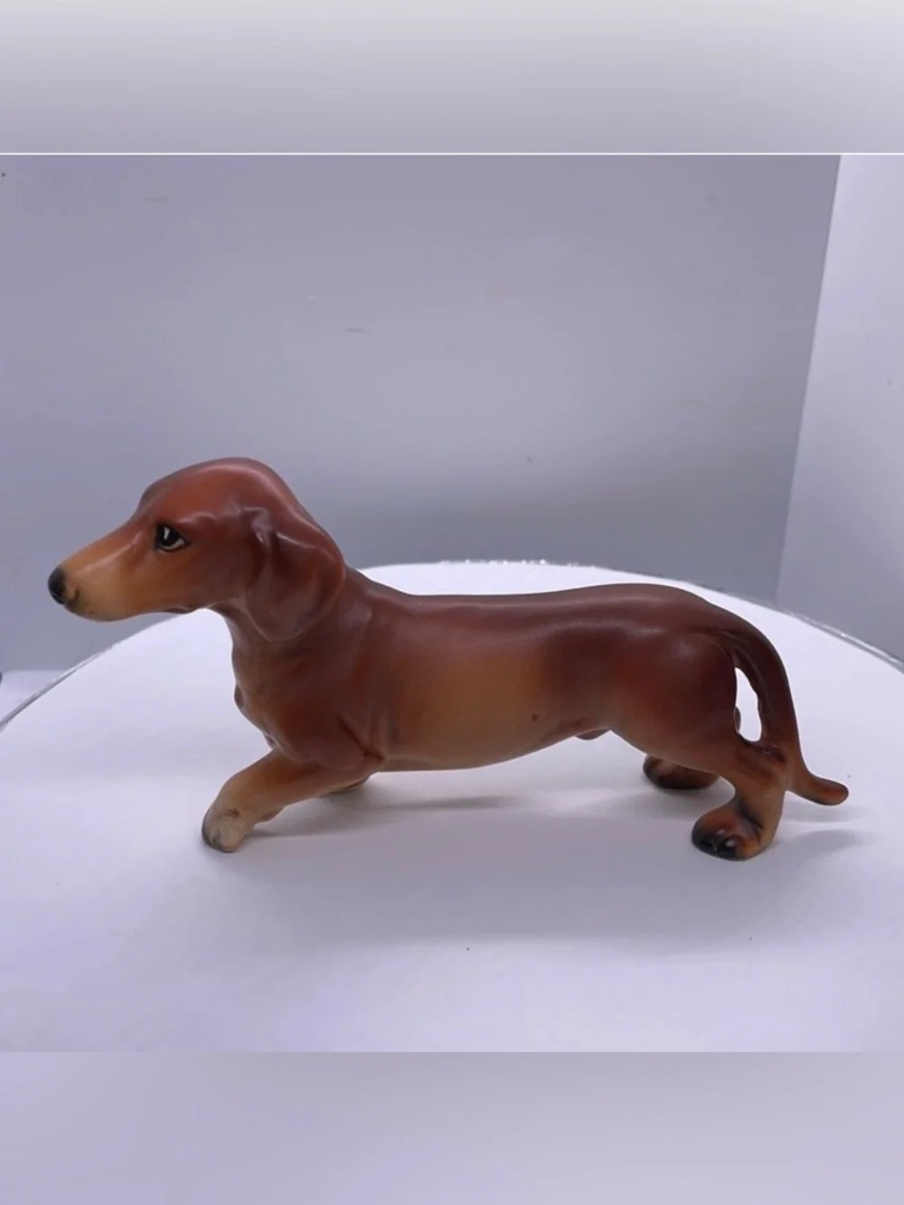 Dachshund porcelain vintage figurine.